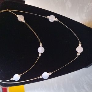 Glitter silver wire and beads necklace.